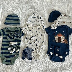 0-3 months bundle of 100% cotton baby onesies, matching caps, mittens and socks.